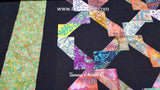 Photo showing digital quilting pattern on quilt.
